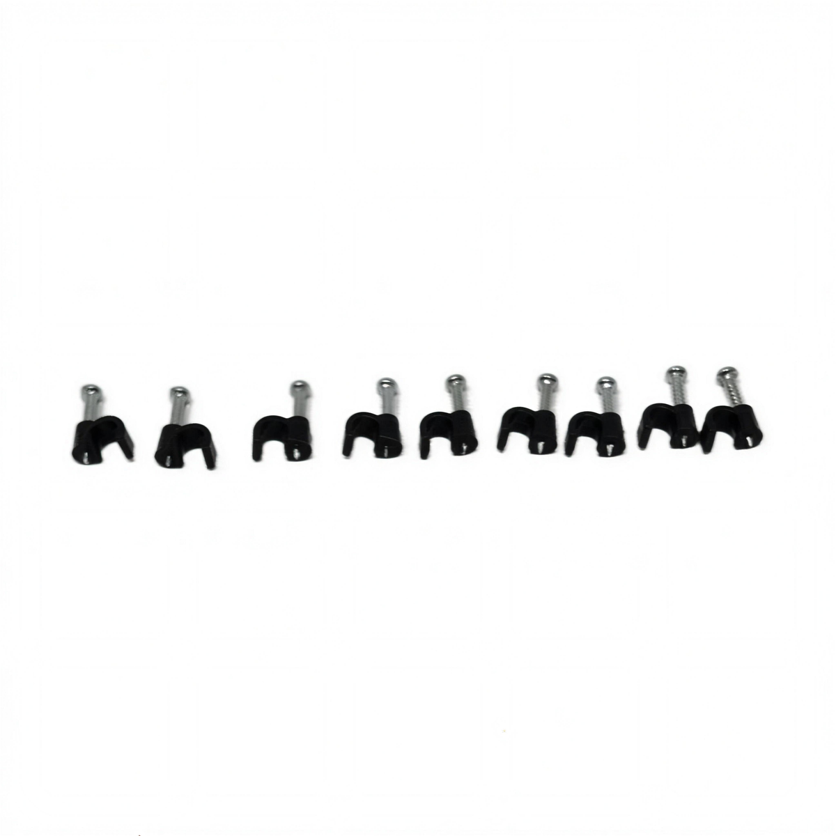Row of QualGear 4 mm black cable clips with steel nails, laid out on a white background
