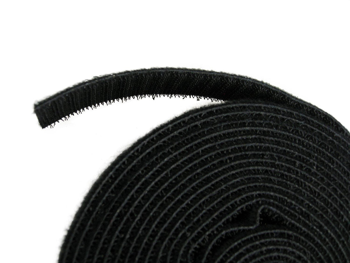QualGear reusable cable tie roll 3/4 in x 15 ft black, side view.