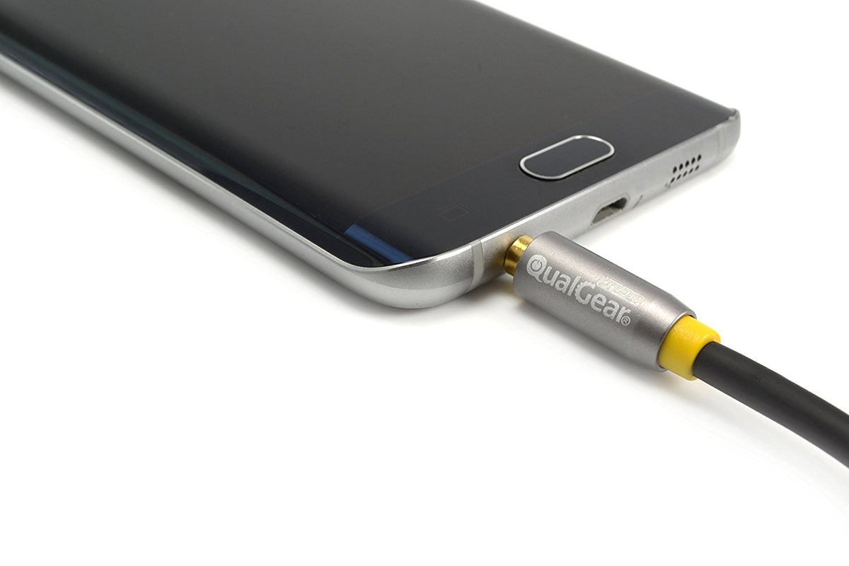 QualGear aux audio cable plugged into a smartphone