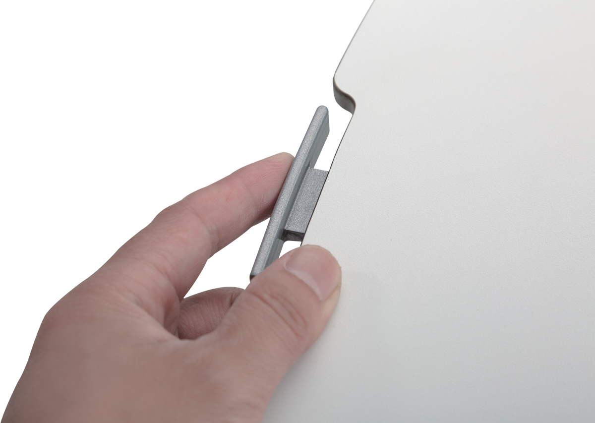 Star Ergonomics Hand showing the way you press the sides to make it move up or down 