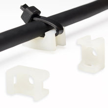 White QualGear saddle mount anchoring a black cable with a tie through the 4.5 mm slot
